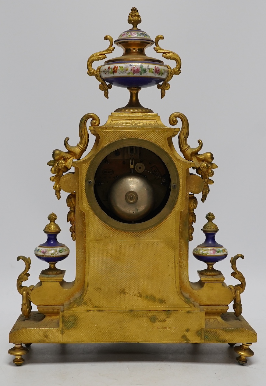 A late 19th century French ormolu mantel clock, MR and Co. Ernest Viroy, with key and pendulum, 39cm